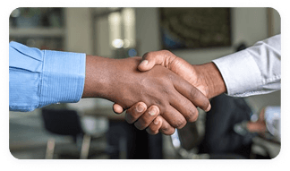 Professionals reviewing insurance contracting documents together